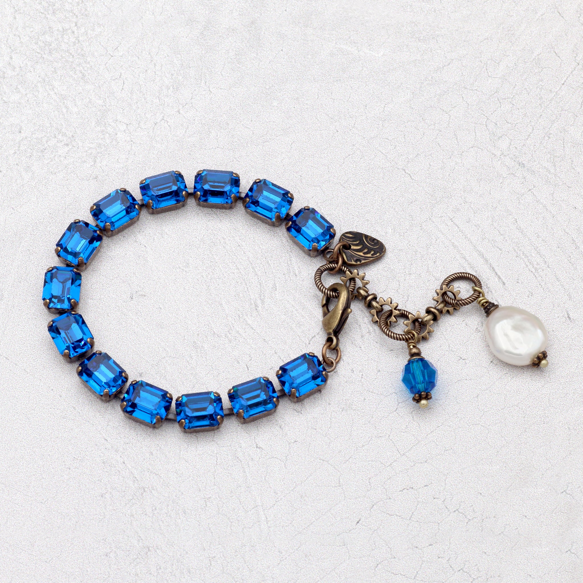 Capri blue crystal bracelet with large freshwater pearl