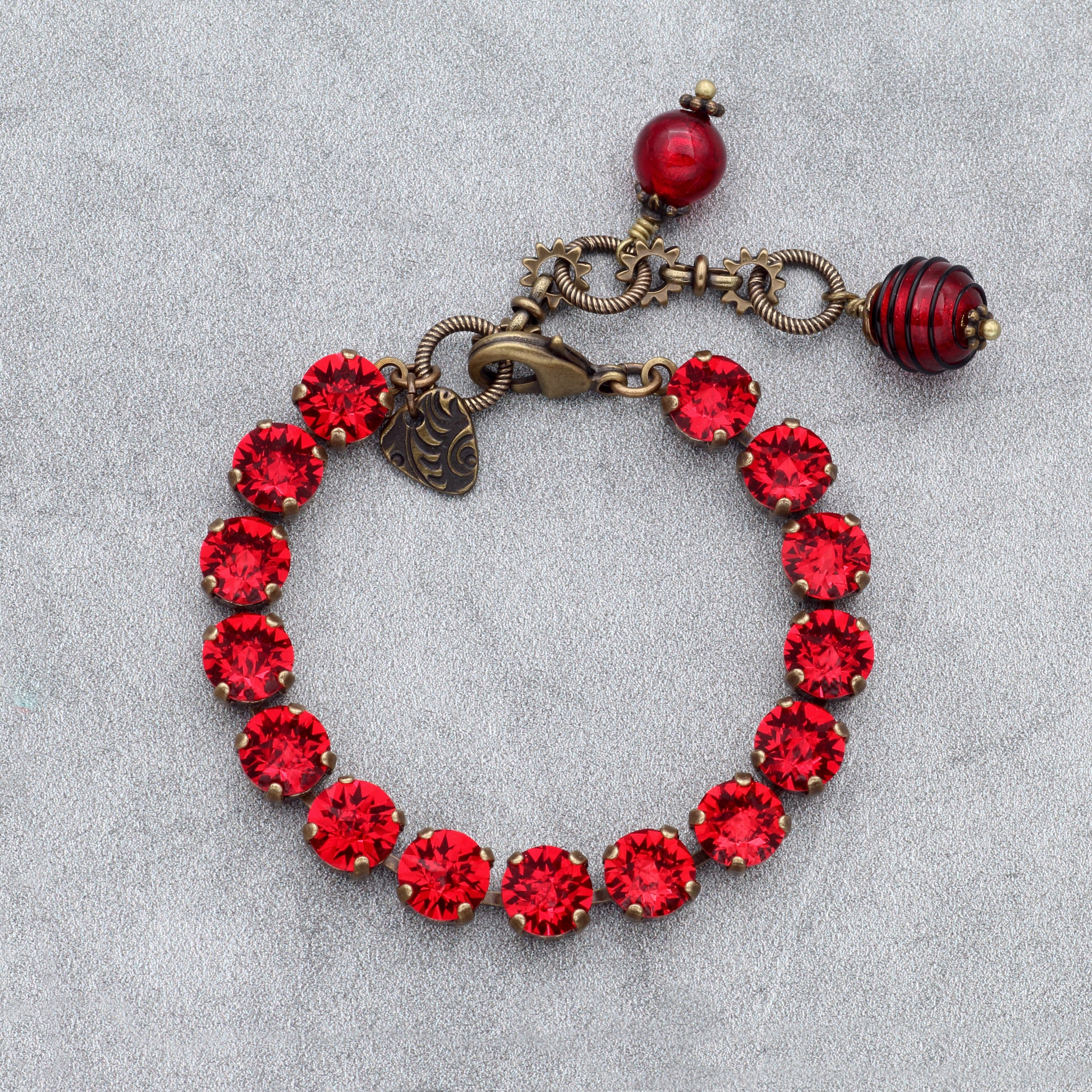 Fiery Red Crystal Stud Bracelet with Antiqued Brass