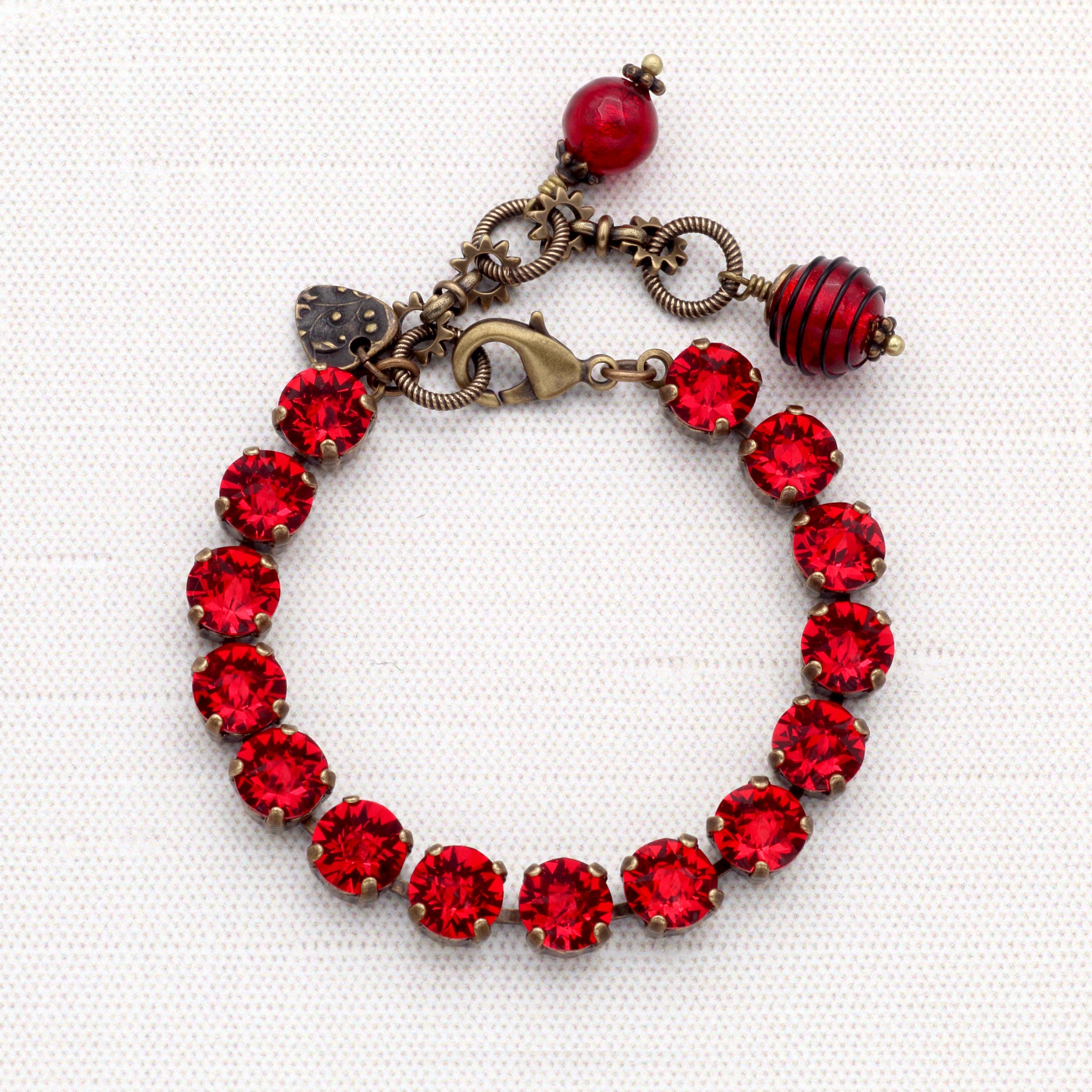 Fiery Red Crystal Stud Bracelet with Antiqued Brass